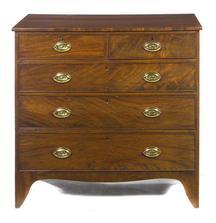 Appraisal: A GEORGE III MAHOGANY CHEST OF DRAWERS fitted two short