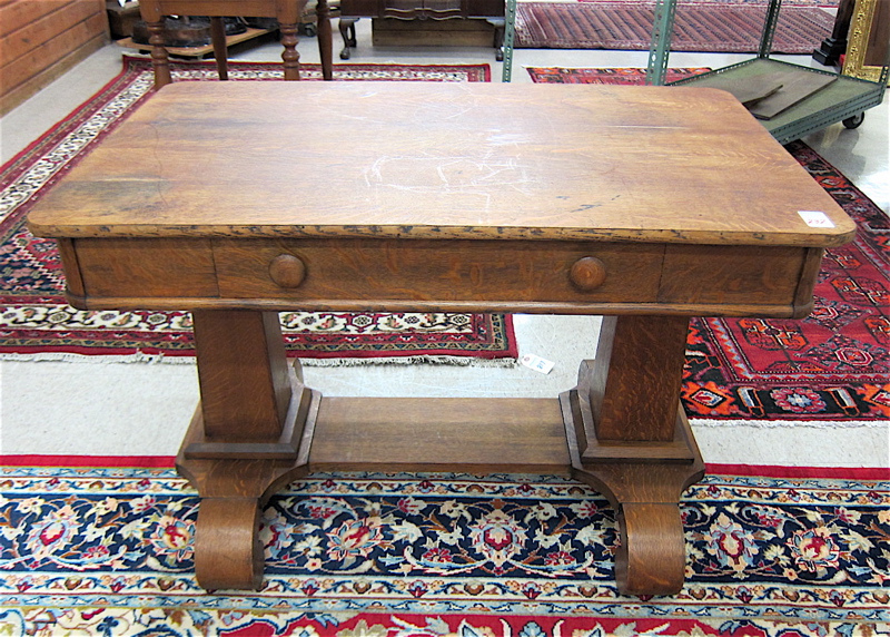 Appraisal: AN OAK LIBRARY TABLE Empire Revival design American c having