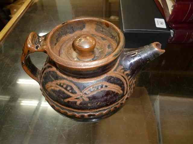 Appraisal: A WINFORD BRIDGE POTTERY TEAPOT with brown glaze and incised