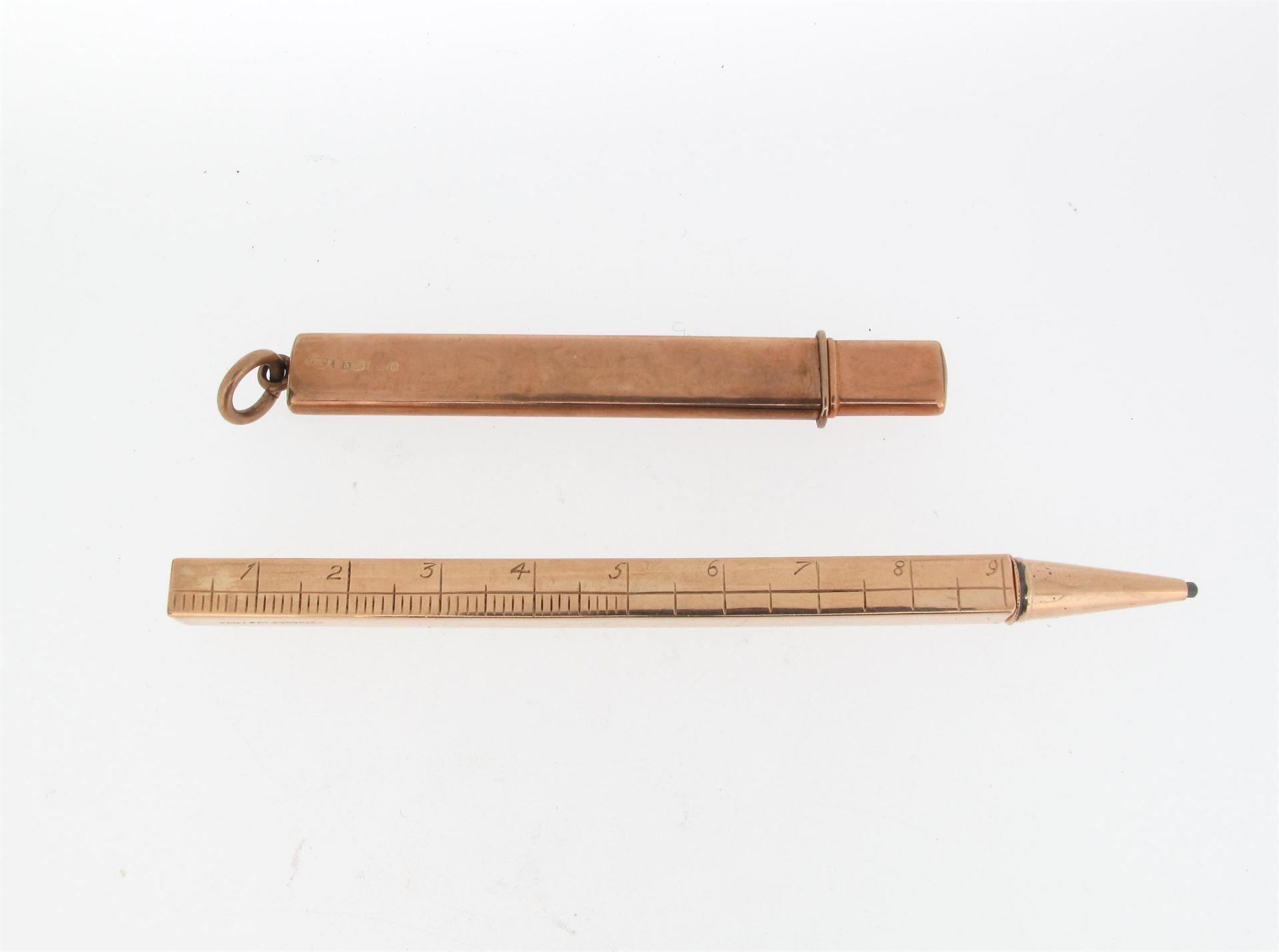 Appraisal: A ct gold extending ruler propelling pencil