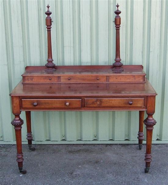 Appraisal: th century mahogany dressing table with adjustable mirror raised on