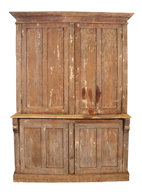 Appraisal: A VICTORIAN PAINTED PINE CUPBOARD with panelled doors above panelled