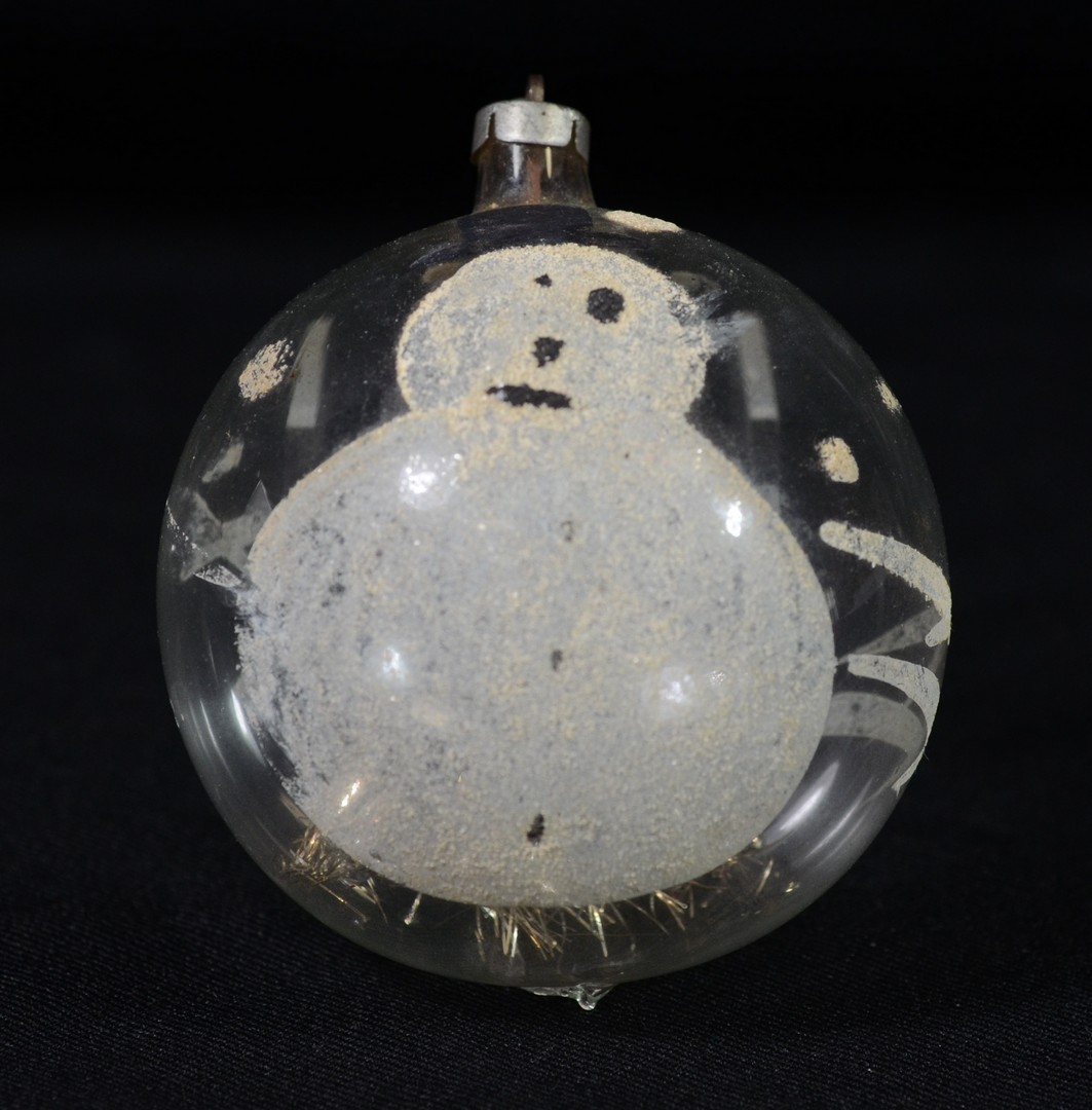 Appraisal: Hand painted snowman on blown glass ornament with tinsel interior