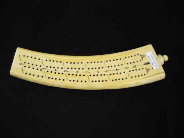 Appraisal: Carved Walrus Ivory Tusk Cribbage Board footed from alaska long