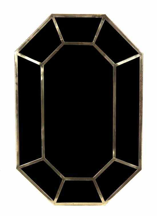 Appraisal: An Italian Brass Pier Mirror of elongated octagonal form having