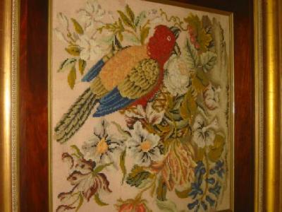 Appraisal: A BERLIN WOOLWORK PICTURE depicting a parrot and flowers unsigned