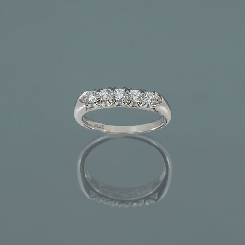 Appraisal: PLATINUM RETRO DECO BAND WITH DIAMONDS Anniversary ring with fine