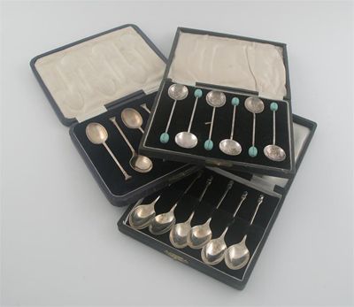 Appraisal: Two cased modern Sheffield made sets of coffee spoons and