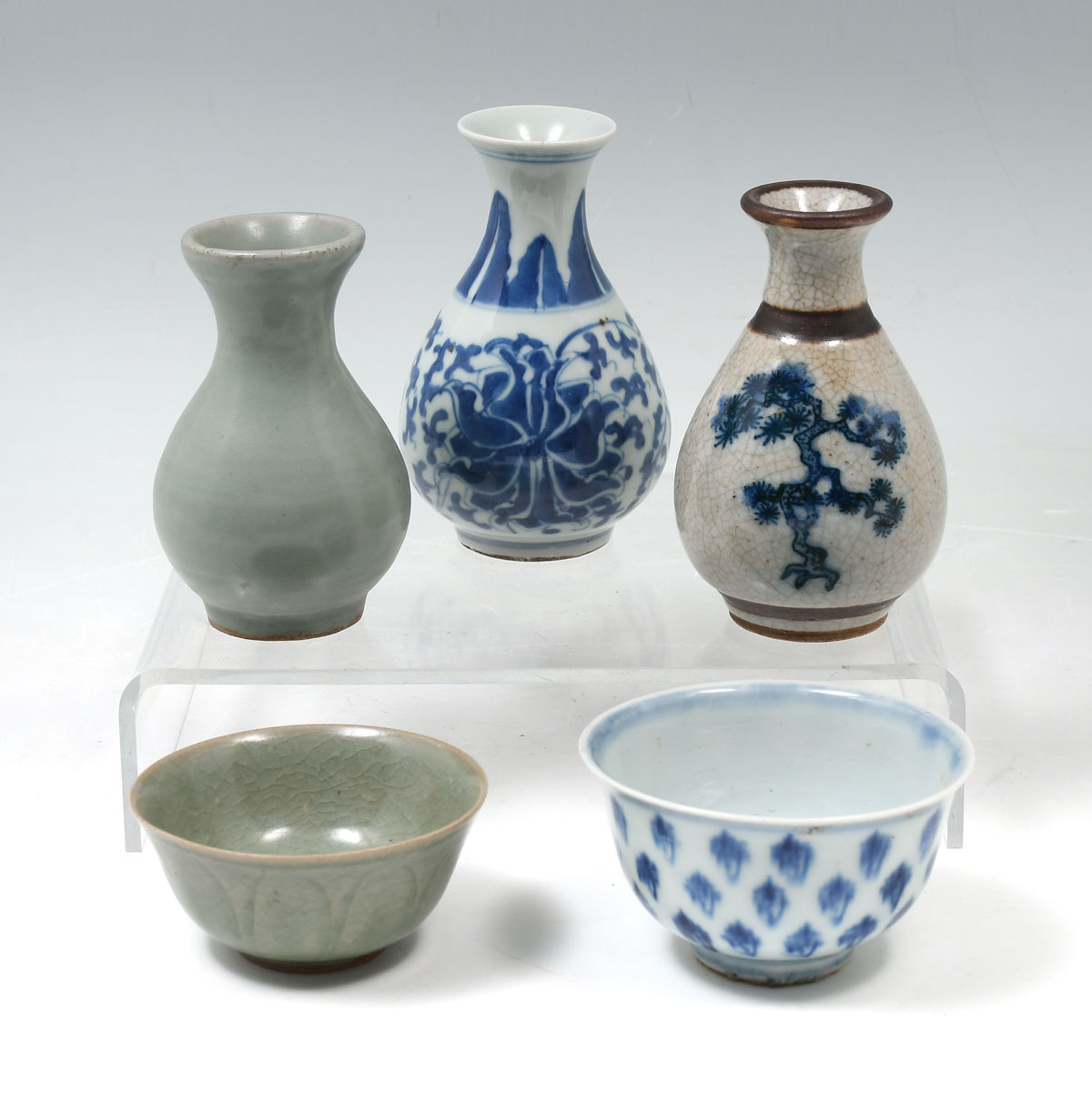 Appraisal: PC CHINESE PORCELAIN VASE AND TEACUP COLLECTION Comprising - Celadon