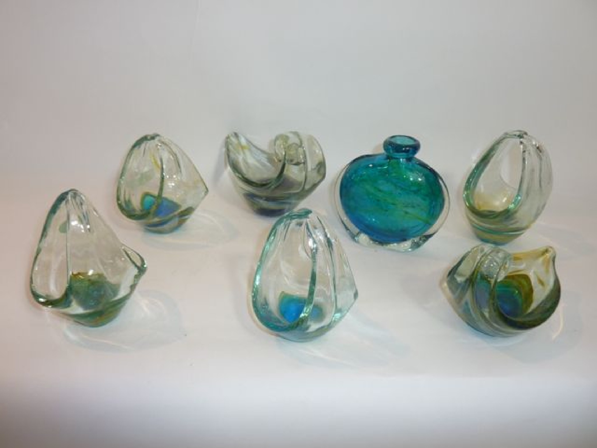 Appraisal: A selection of decorative glass to include four basket shaped