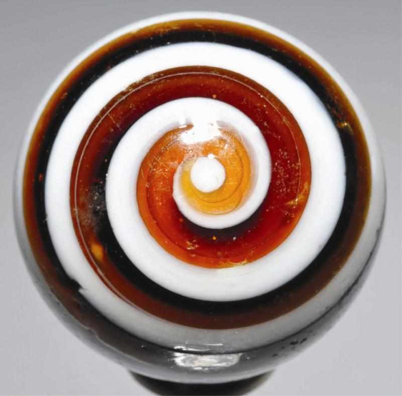 Appraisal: Navarre Horizontal Swirl Marble Maglite reddish amber base with a