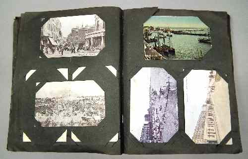 Appraisal: An early th Century postcard album containing a quantity of