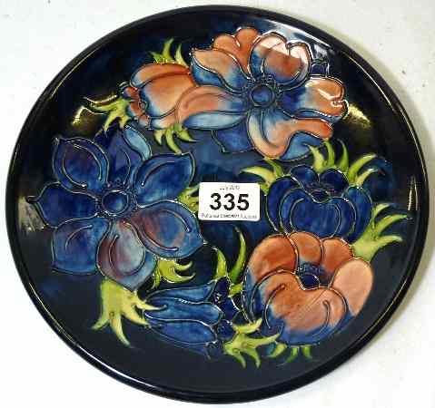 Appraisal: Moorcroft Wall Plaque decorated in the Pansies design diameter cm