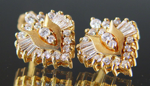 Appraisal: DIAMONDS AND GOLD EARRINGS K yellow gold earrings with round