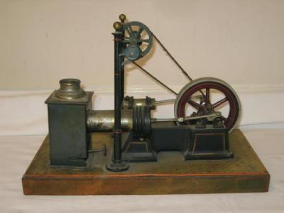 Appraisal: An Ernst Plank hot air engine spirit burner to cylinder