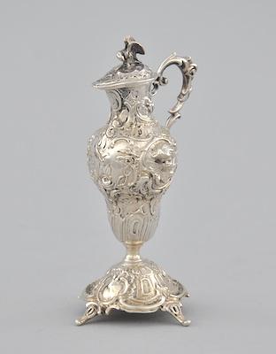 Appraisal: A Miniature Silver Lidded Ewer Measuring approx - H the