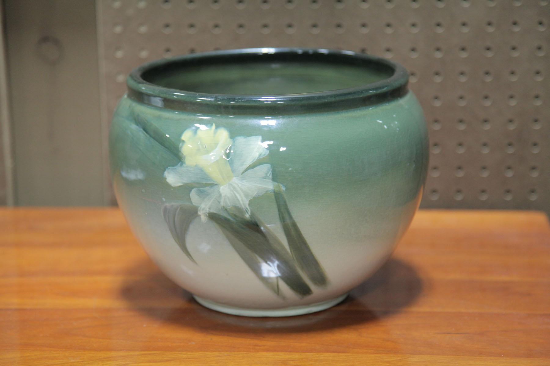 Appraisal: WELLER JARDINIERE Ohio late th century Eocean jardiniere with daffodil