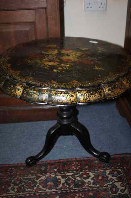 Appraisal: A VICTORIAN PAPIER M CH CIRCULAR TRIPOD TABLE with flower