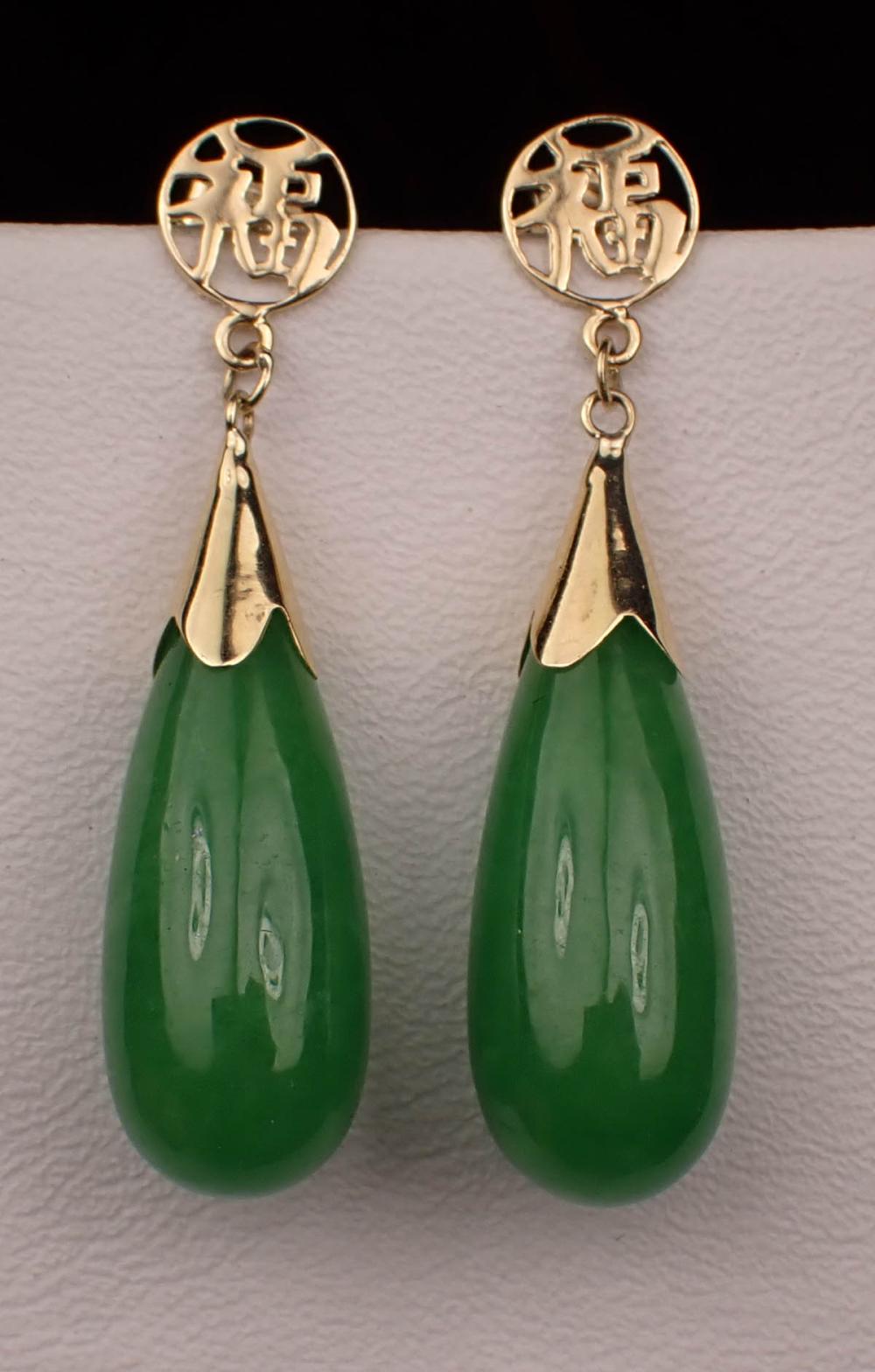 Appraisal: PAIR OF JADE AND FOURTEEN KARAT GOLD EARRINGS each dangle