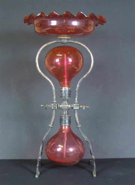 Appraisal: A late th century cranberry glass and white metal fountain