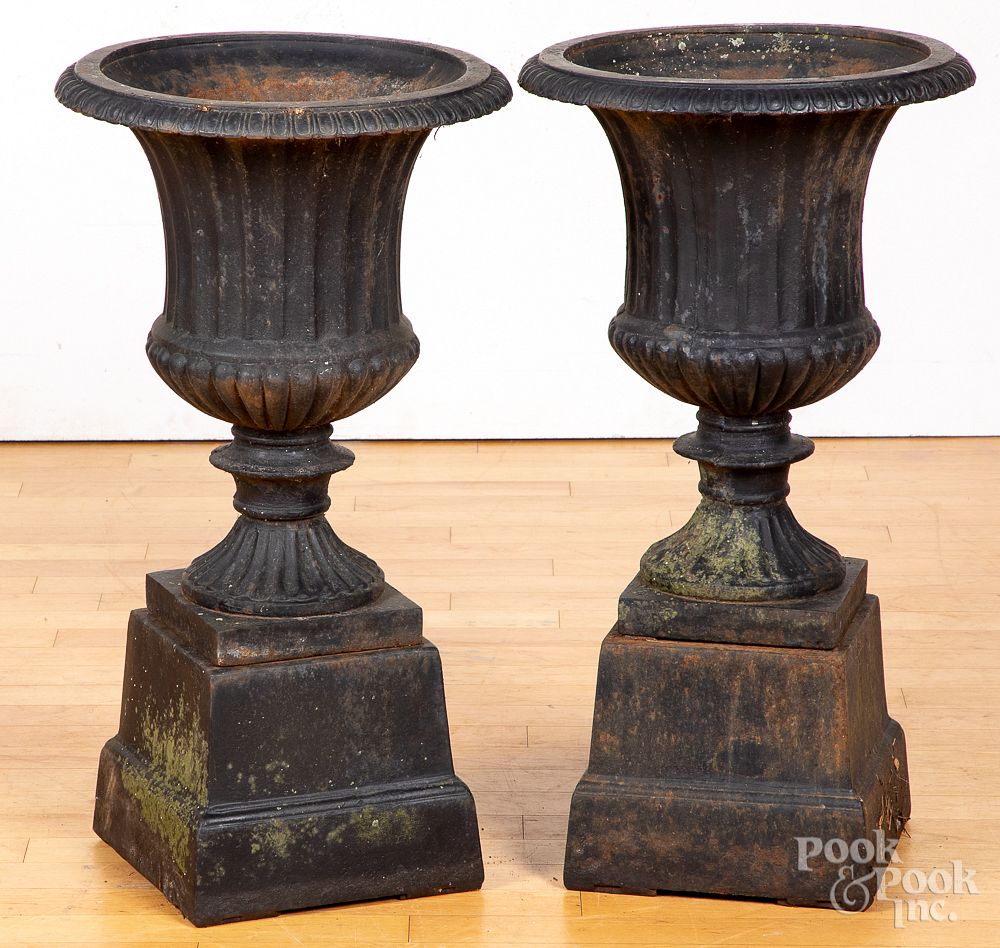 Appraisal: Pair of Victorian cast iron garden urns Pair of Victorian