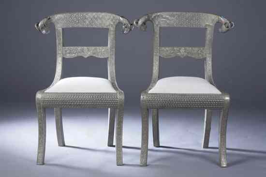 Appraisal: PAIR SYRIAN SILVERED KLISMOS SIDE CHAIRS th century Tablet-form crest