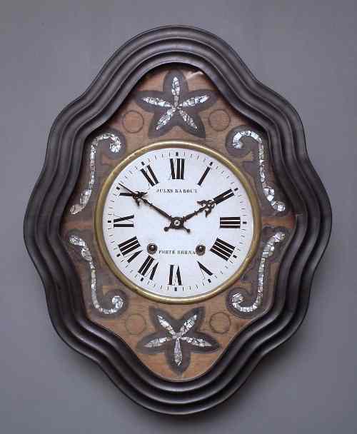 Appraisal: A th Century French walnut and ebonised cased wall clock