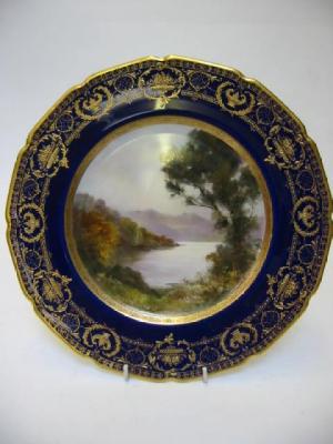 Appraisal: A ROYAL DOULTON CHINA CABINET PLATE painted by E A