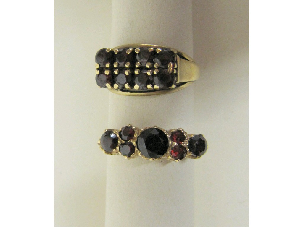 Appraisal: Two ct gold garnet set dress rings