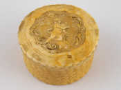 Appraisal: An th century circular ivory box carved as wickerwork the