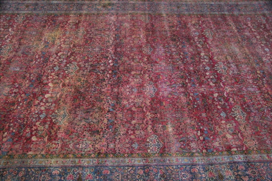 Appraisal: KERMAN RUG - App ft in x ft in Staining