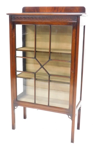 Appraisal: An early thC mahogany display cabinet with a raised back