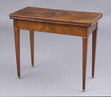 Appraisal: DIRECTOIRE PROVINCIAL WALNUT GAMES TABLE The rectangular folding and swivel