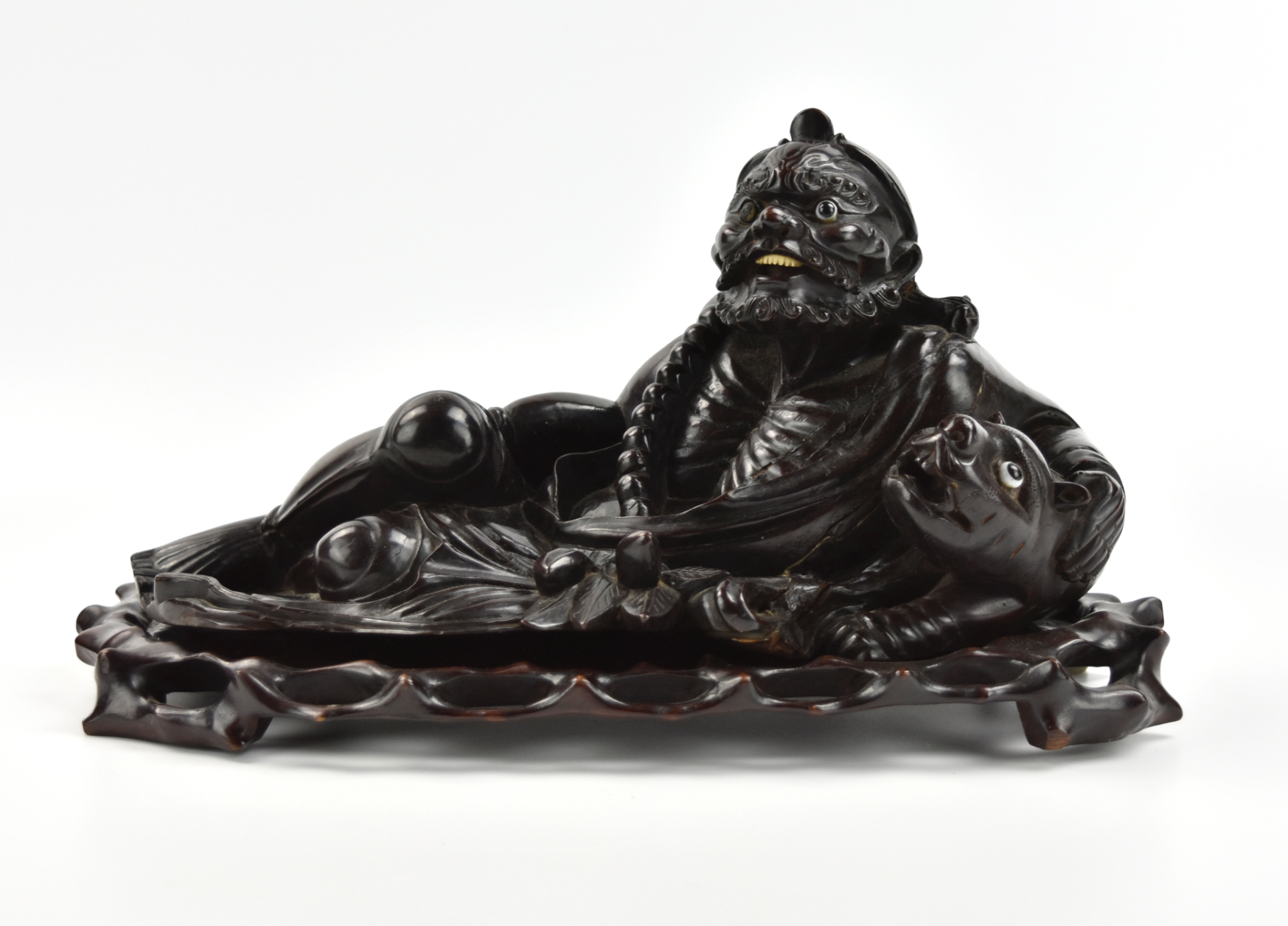 Appraisal: carved luohan wood figure in a reclined position with bare