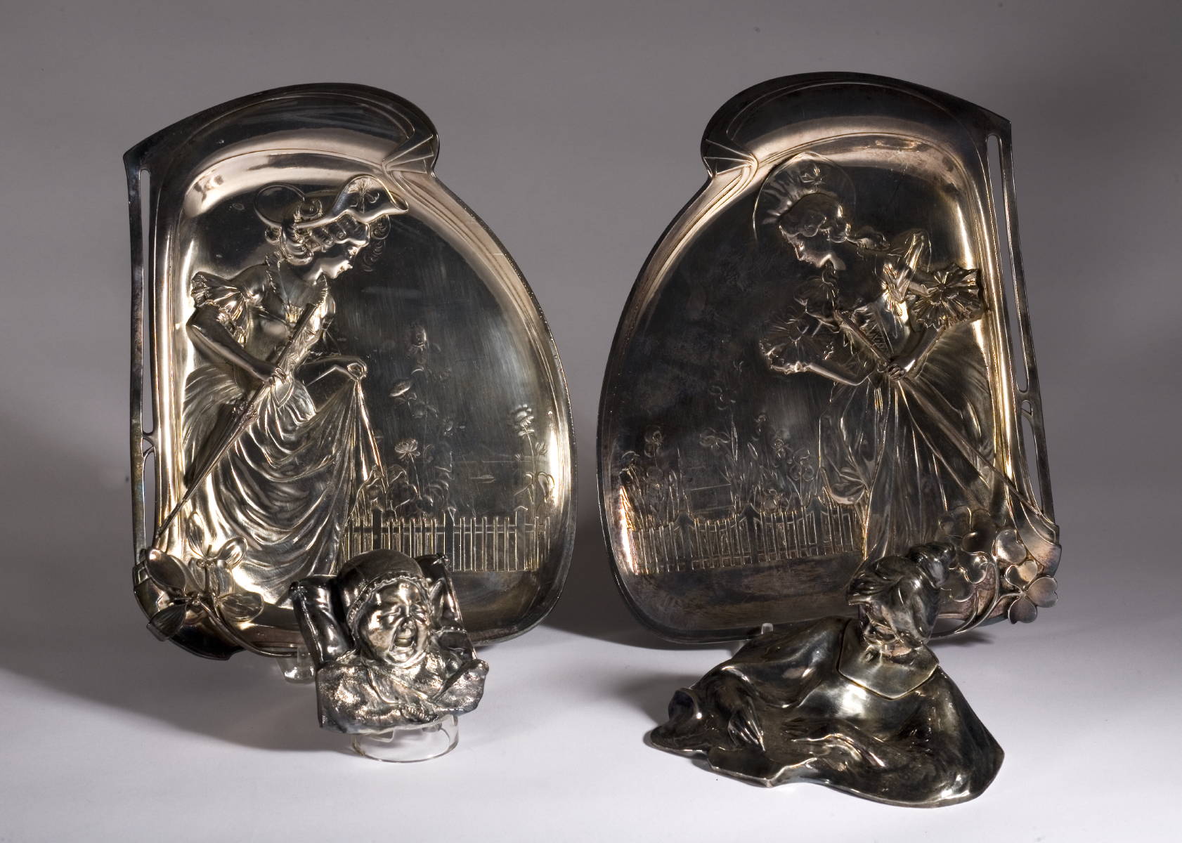 Appraisal: GROUP OF SILVERPLATE TABLE OBJECTS INCLUDING A PAIR OF FIGURAL