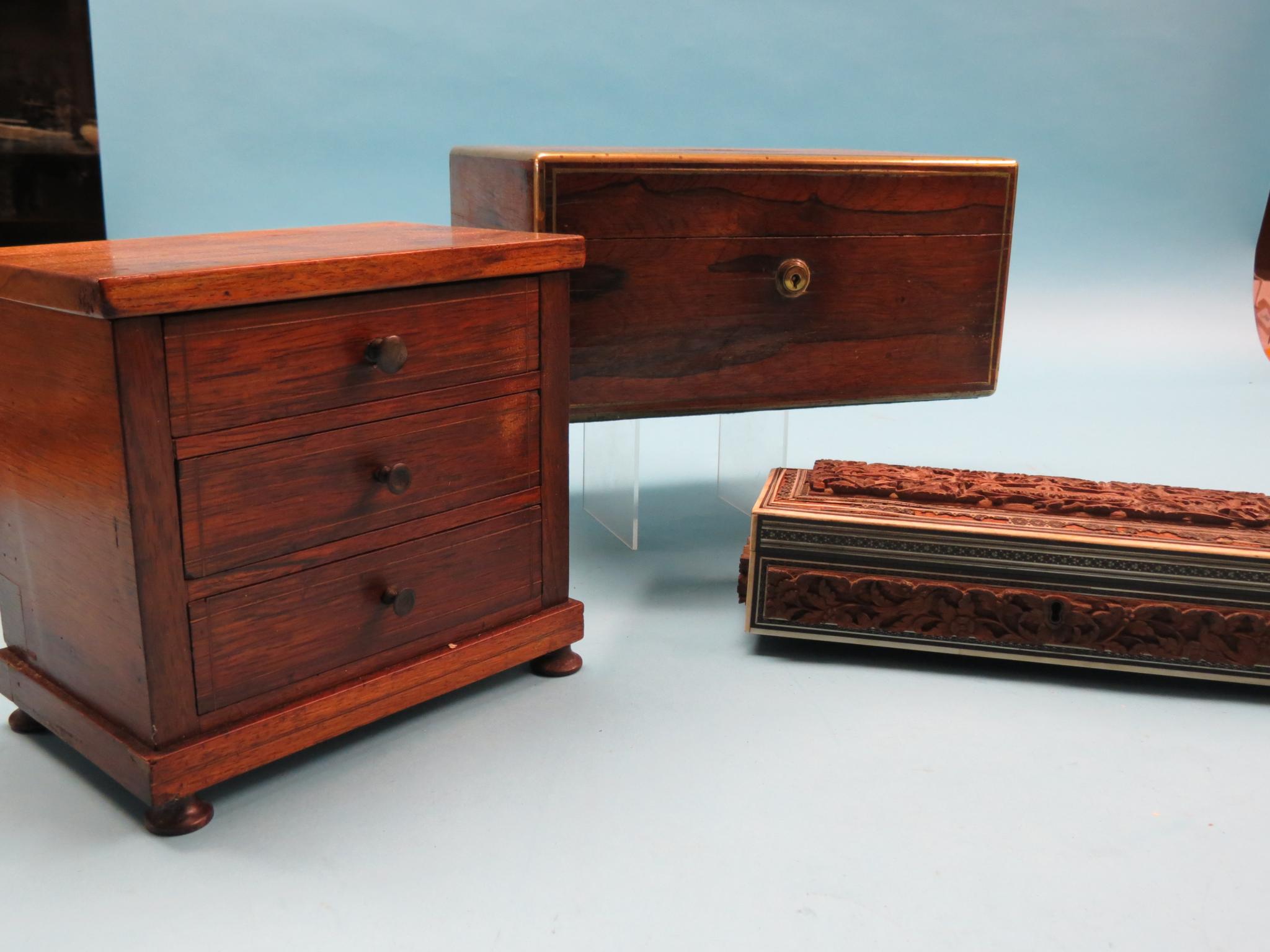 Appraisal: A Victorian rosewood three-drawer chest with walnut top in together