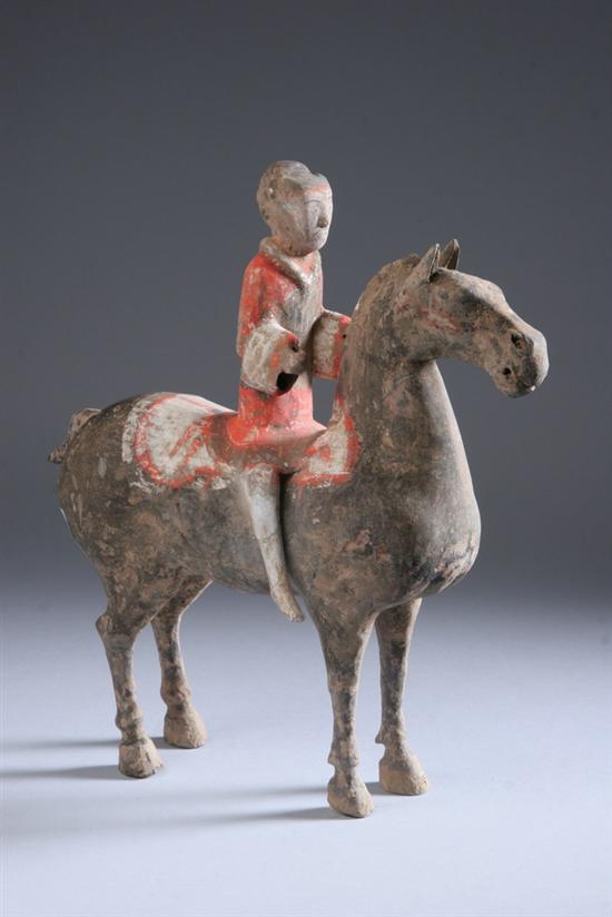 Appraisal: CHINESE POLYCHROME GREY POTTERY FIGURE OF EQUESTRIAN Han Dynasty -