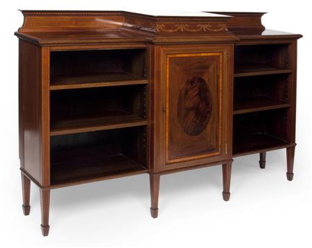 Appraisal: An Edwardian inlaid mahogany breakfront bookcase the projected moulded cornice