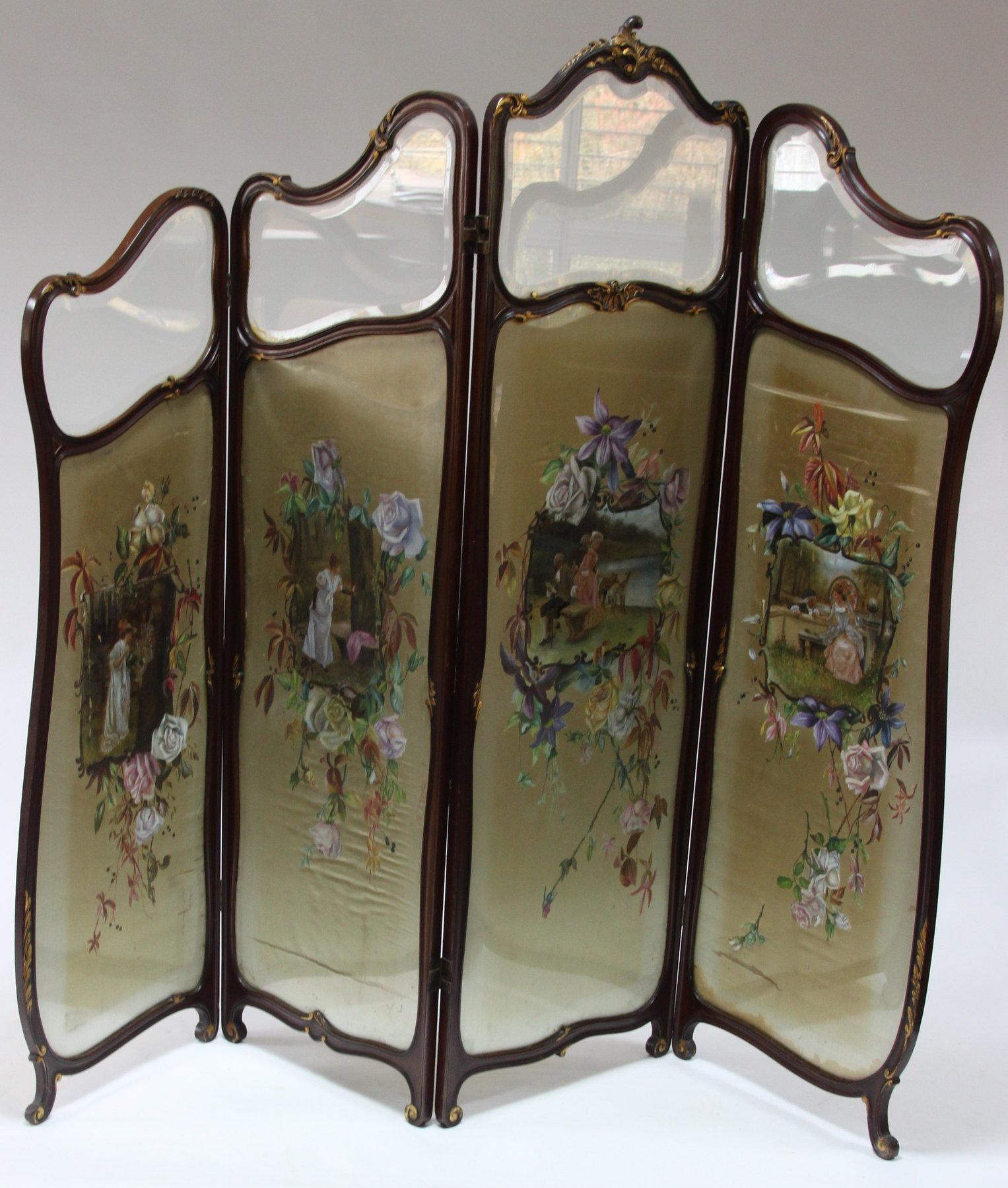 Appraisal: A three-fold salon screen with gilded scrolls to the cresting