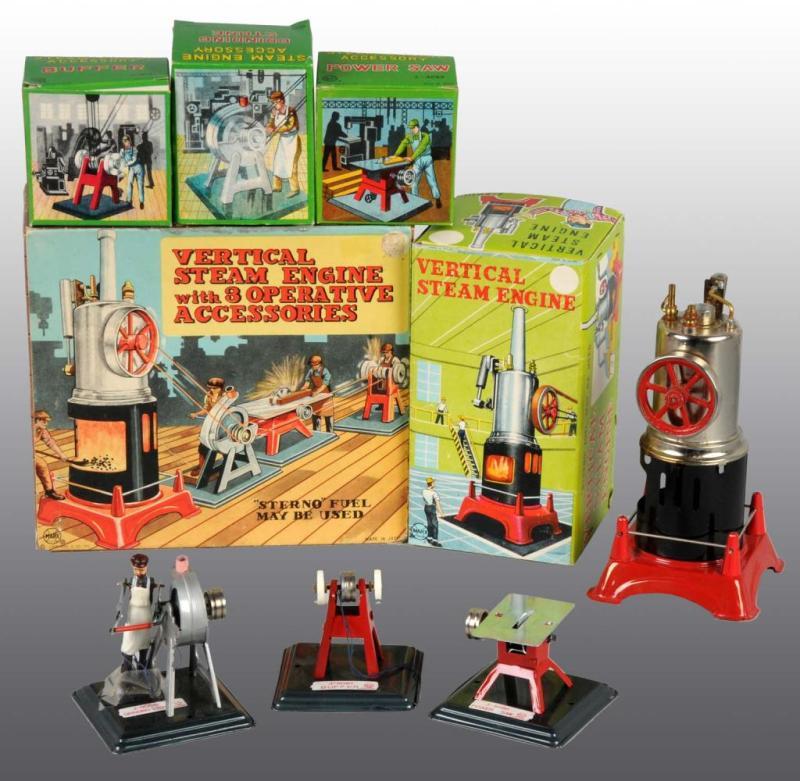 Appraisal: Marx Vertical Steam Engine Description Includes three accessories in original