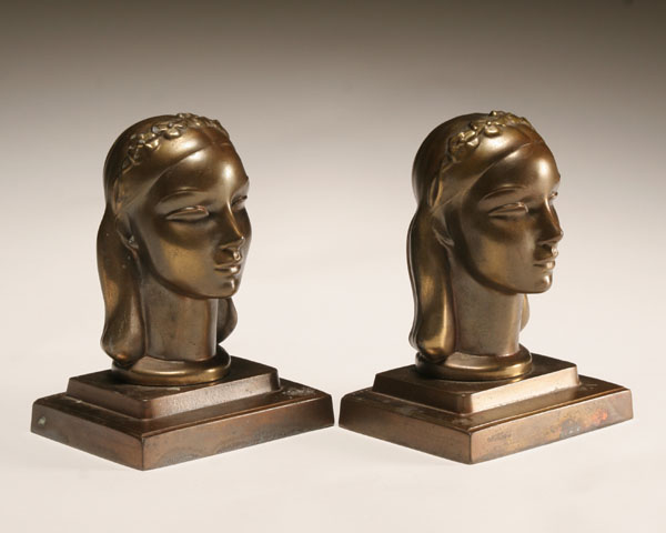 Appraisal: Frankart spelter deco figural bookends patinated female countenance on tiered