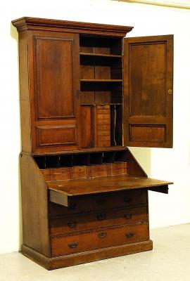 Appraisal: AN OAK BUREAU CABINET with pollard oak banding moulded cornice