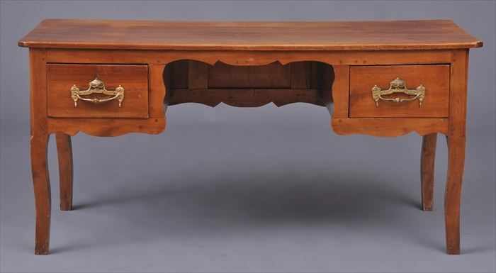 Appraisal: LOUIS XV PROVINCIAL FRUITWOOD KNEEHOLE BUREAU PLAT The three-plank top