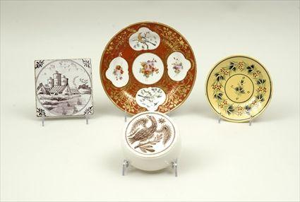 Appraisal: Four Pottery and Porcelain Articles Including a Delft manganese decorated