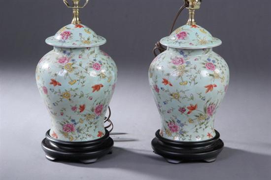 Appraisal: PAIR CHINESE FAMILLE ROSE VASES Floral decoration electrified - in