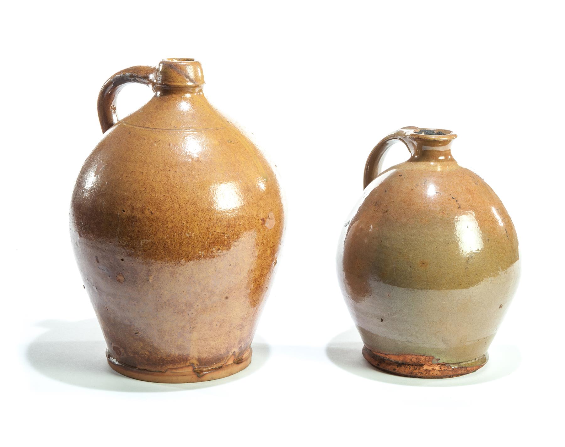 Appraisal: TWO NEW ENGLAND REDWARE JUGS First quarter- th century Ovoid