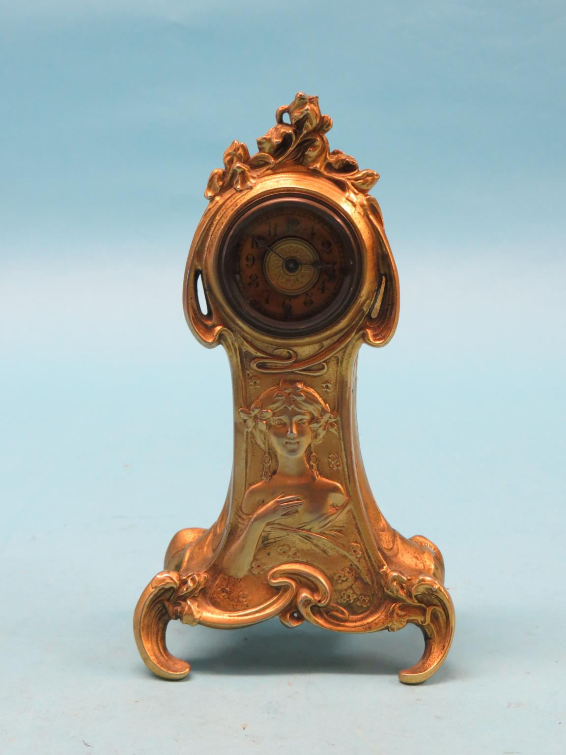 Appraisal: An Art Nouveau gilt-metal mantel clock spring-driven movement case embossed