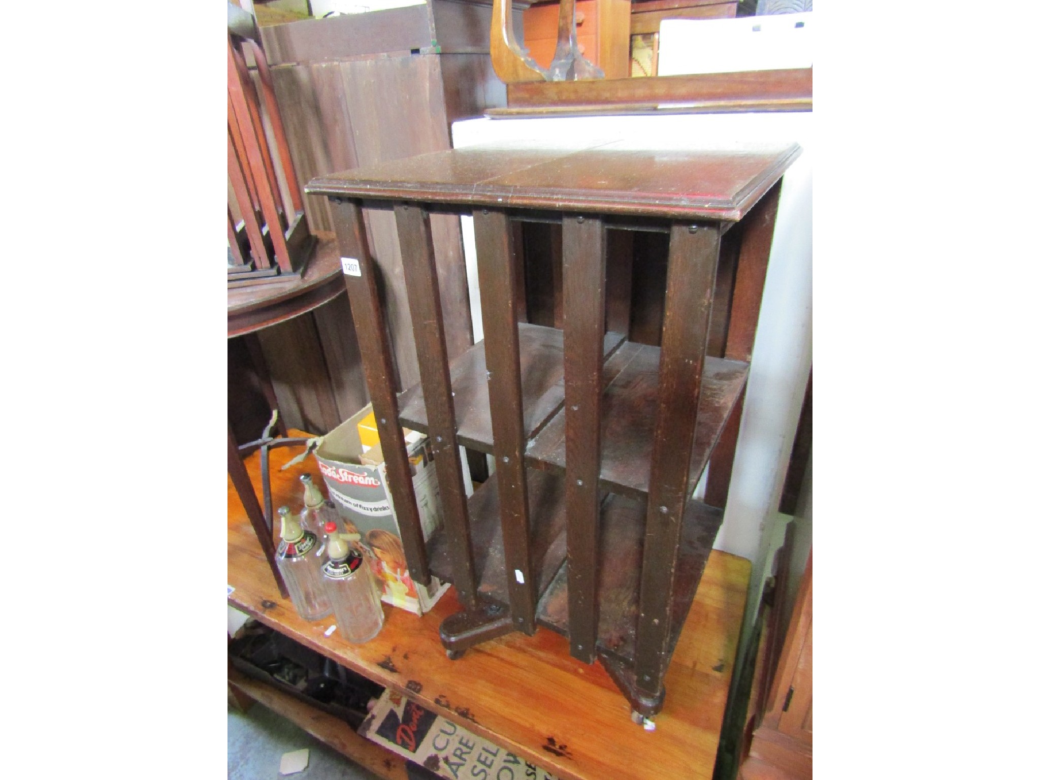 Appraisal: An early th century oak floorstanding revolving bookcase of square