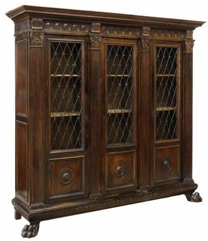 Appraisal: Italian Renaissance Revival walnut bookcase early th c cornice with