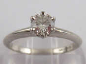 Appraisal: A platinum diamond solitaire ring by Tiffany Co accompanied by